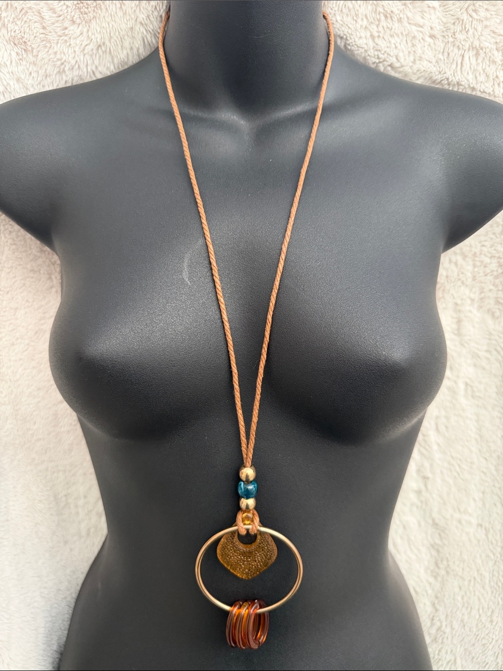 Long Brown Cord Necklace with Gold and Teal Accents